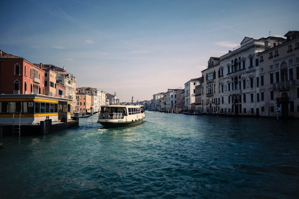 Stunning daytime view of a water bus on the Grand Canal, Venice, Italy.